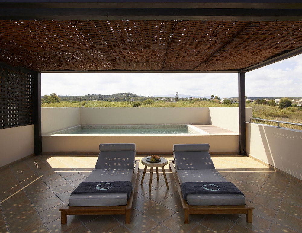 Asterion Suites & Spa - Designed for Adults — Swimming pool in Platanias
