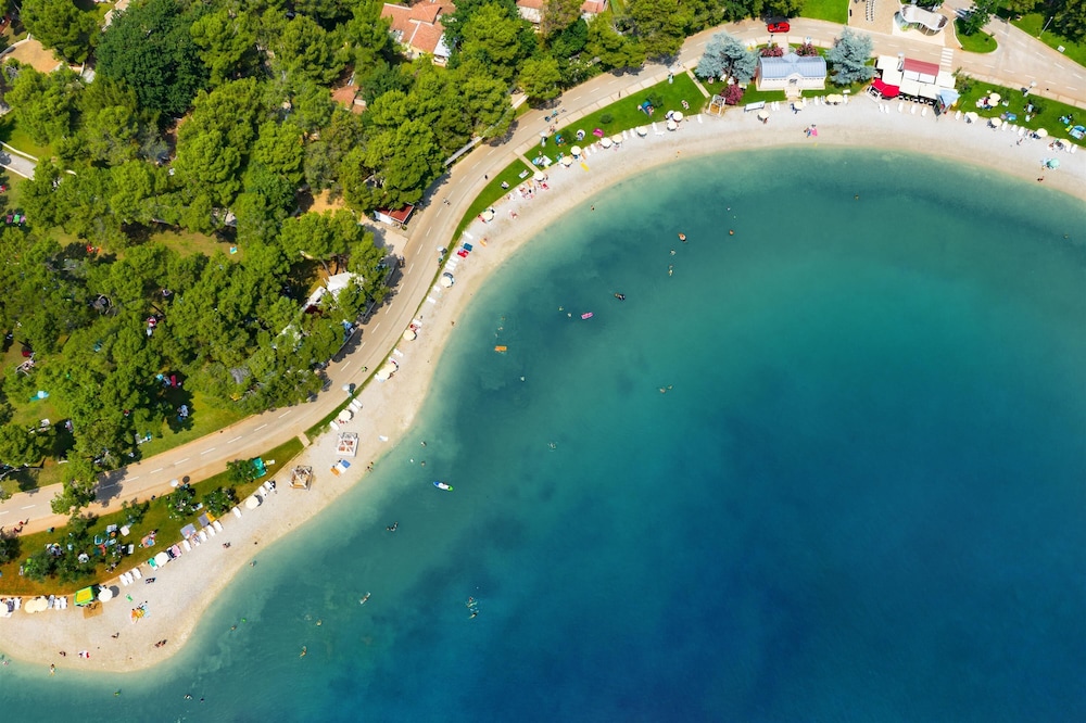 Apartments Stella Plava Laguna — Beach in Umag, Istria