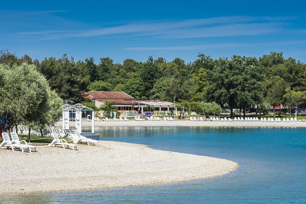 Apartments Stella Plava Laguna — Beach in Umag, Istria