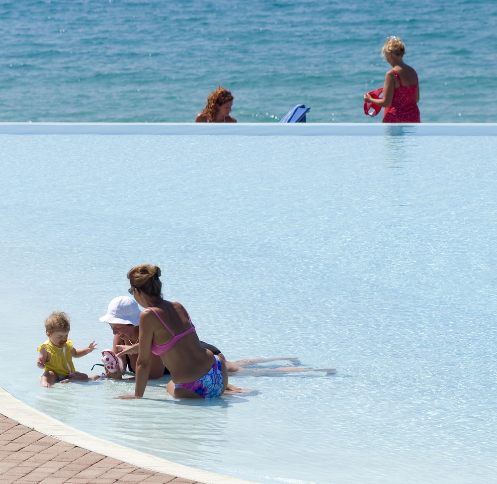 COLONNA GRAND HOTEL CAPO TESTA, a Colonna Luxury Beach Hotel, Santa Teresa Sardegna — Swimming pool in Capo Testa, Sardinia