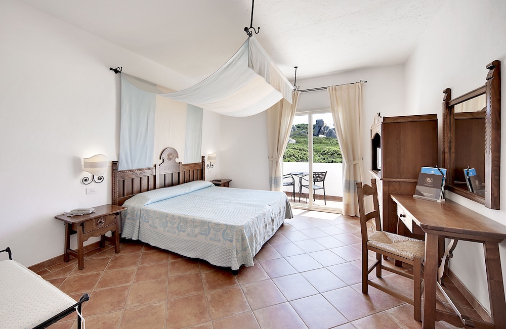 COLONNA GRAND HOTEL CAPO TESTA, a Colonna Luxury Beach Hotel, Santa Teresa Sardegna — Hotel rooms in Capo Testa, Sardinia