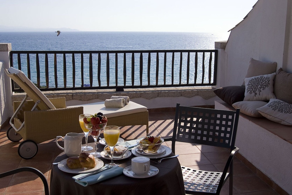 COLONNA GRAND HOTEL CAPO TESTA, a Colonna Luxury Beach Hotel, Santa Teresa Sardegna — Hotel rooms in Capo Testa, Sardinia