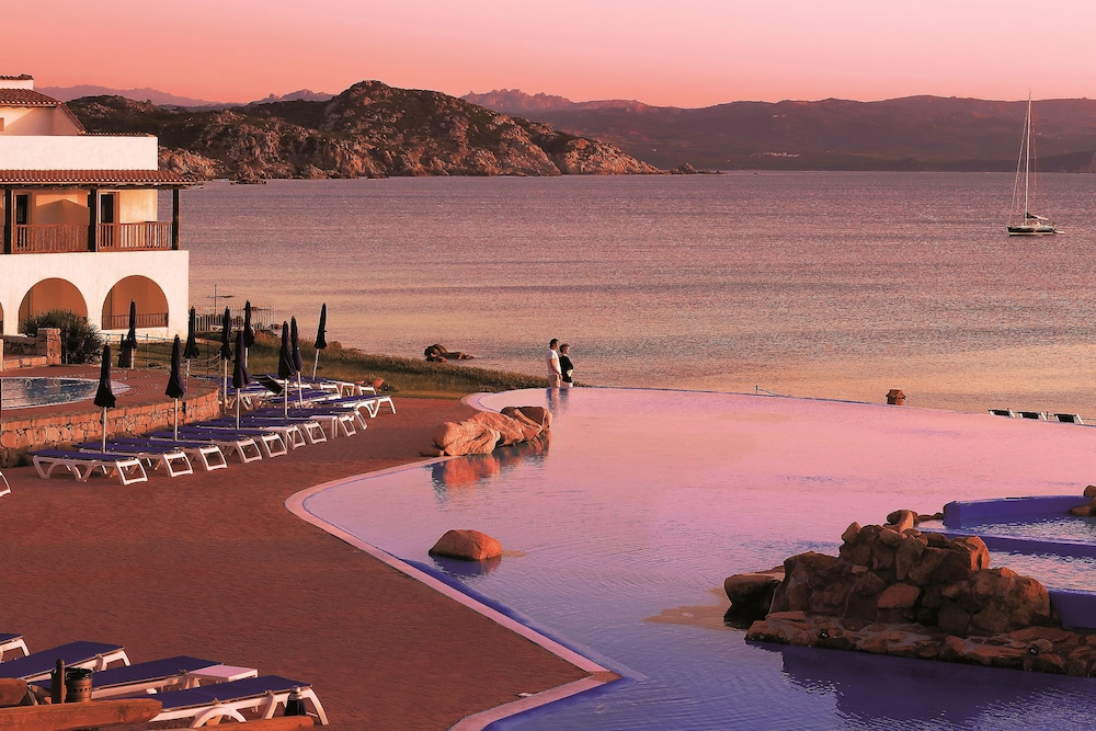 COLONNA GRAND HOTEL CAPO TESTA, a Colonna Luxury Beach Hotel, Santa Teresa Sardegna — Swimming pool in Capo Testa, Sardinia