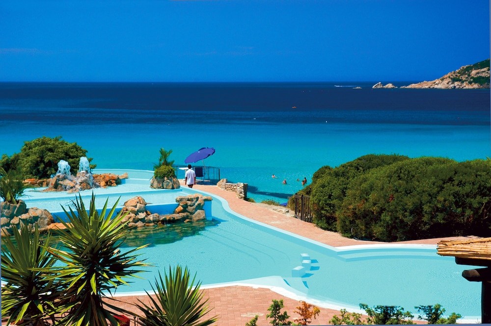 COLONNA GRAND HOTEL CAPO TESTA, a Colonna Luxury Beach Hotel, Santa Teresa Sardegna — Swimming pool in Capo Testa, Sardinia