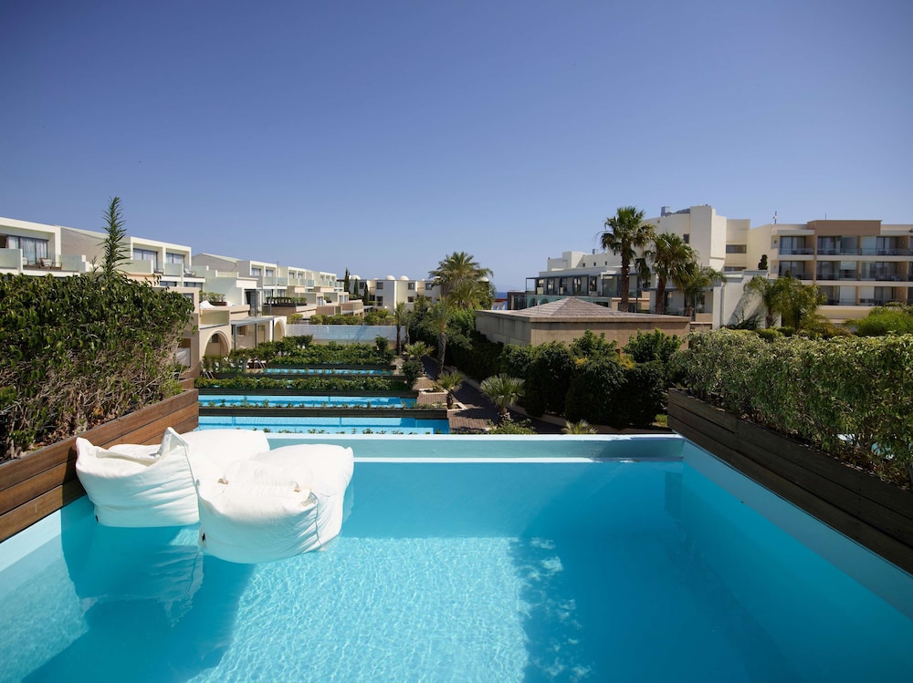 The Ixian Grand & All Suites - Adults Only — Swimming pool in Ialyssos, South Aegean