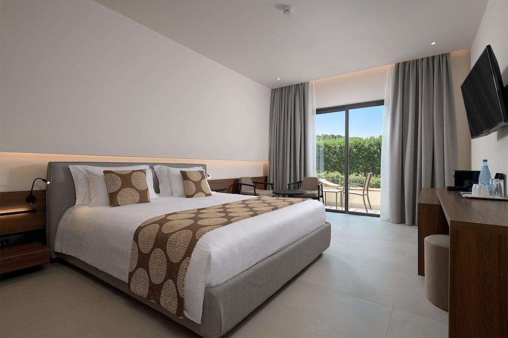 The Ixian Grand & All Suites - Adults Only — Hotel rooms in Ialyssos, South Aegean