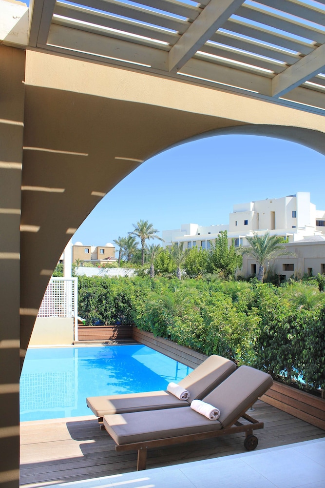 The Ixian Grand & All Suites - Adults Only — Swimming pool in Ialyssos, South Aegean