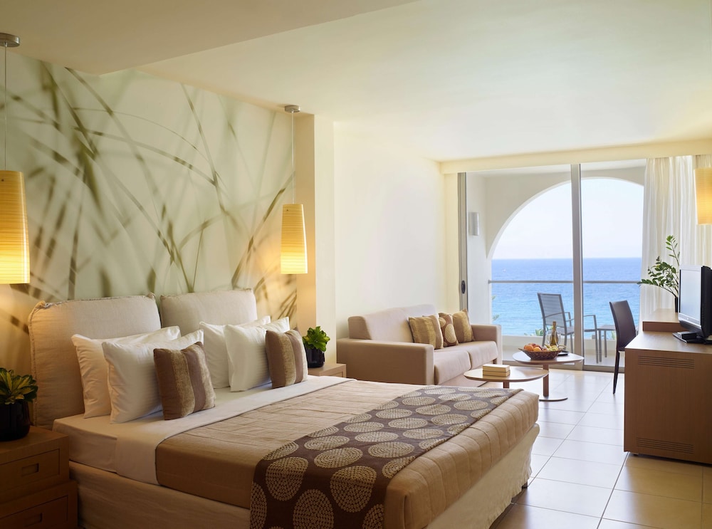 The Ixian Grand & All Suites - Adults Only — Hotel rooms in Ialyssos, South Aegean