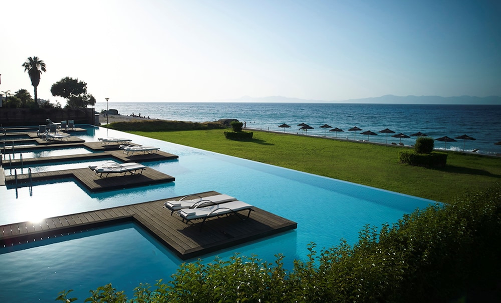 The Ixian Grand & All Suites - Adults Only — Swimming pool in Ialyssos, South Aegean
