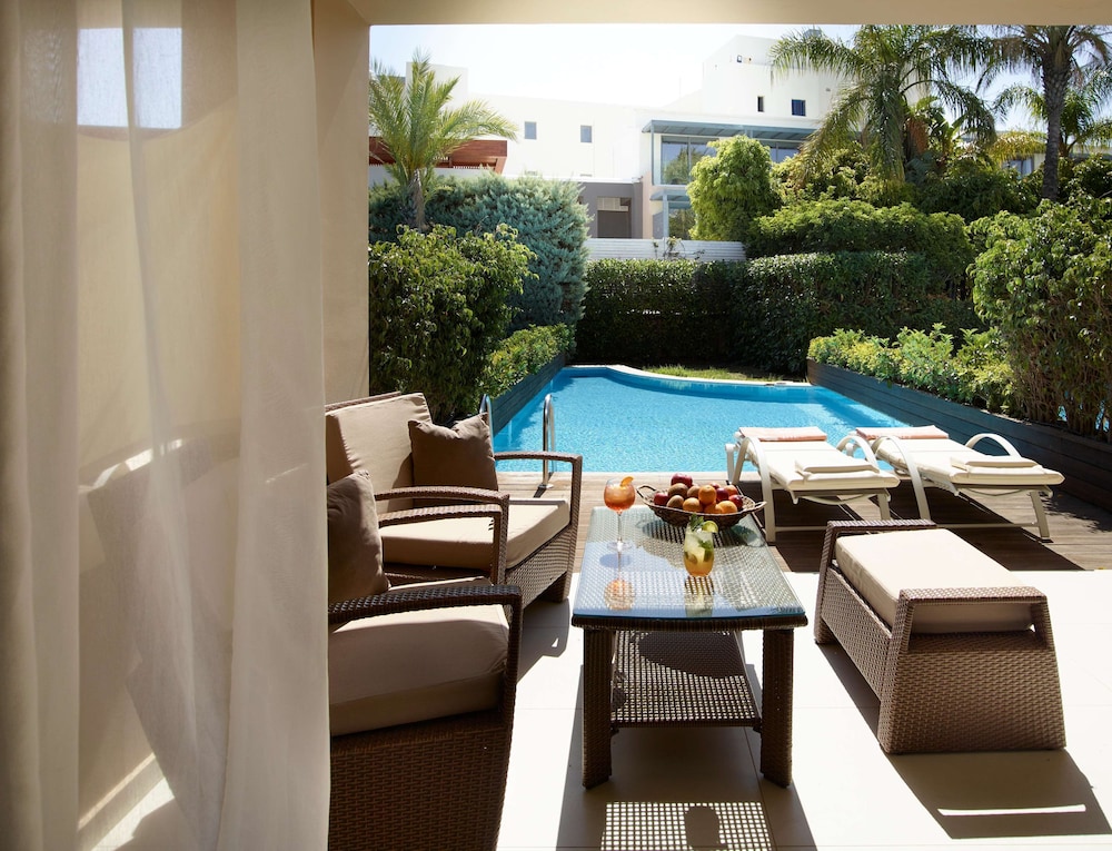 The Ixian Grand & All Suites - Adults Only — Swimming pool in Ialyssos, South Aegean