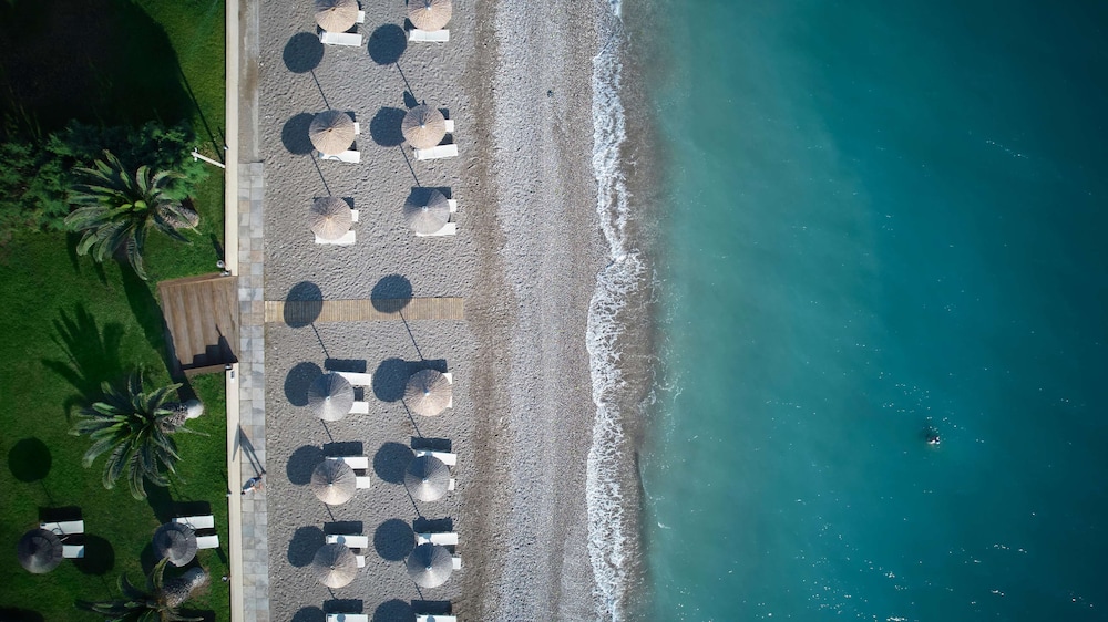 The Ixian Grand & All Suites - Adults Only — Beach in Ialyssos, South Aegean