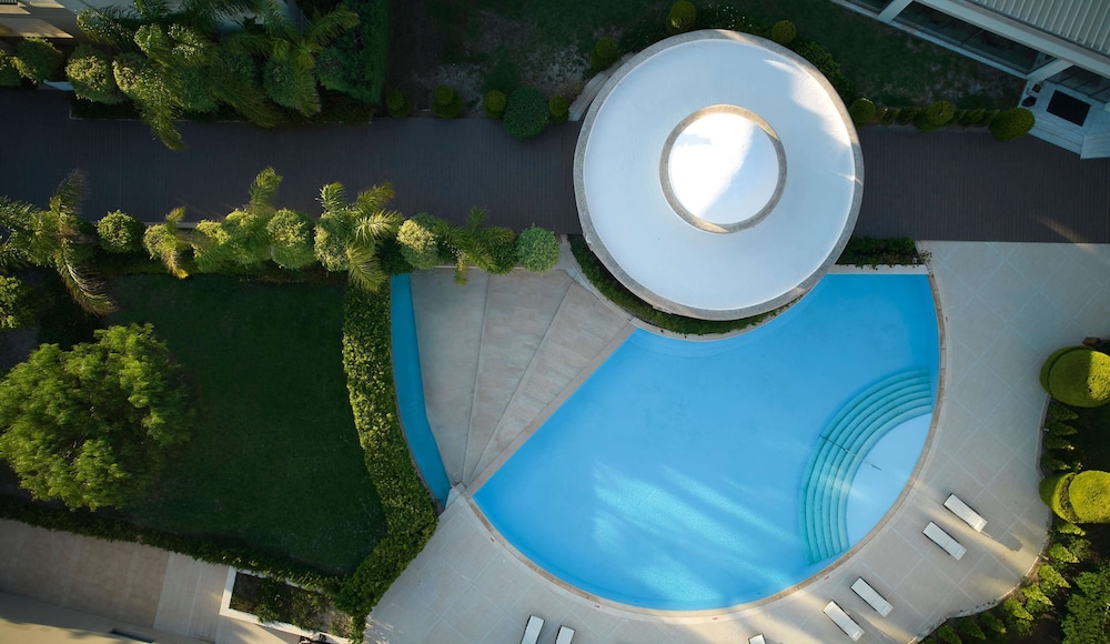 The Ixian Grand & All Suites - Adults Only — Swimming pool in Ialyssos, South Aegean