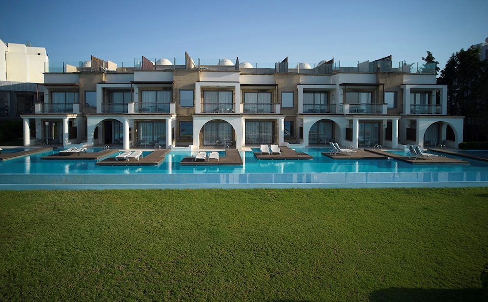 The Ixian Grand & All Suites - Adults Only — Swimming pool in Ialyssos, South Aegean