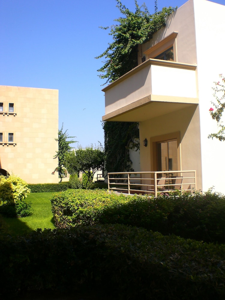 The Ixian Grand & All Suites - Adults Only — Hotel building in Ialyssos, South Aegean