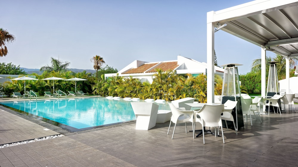 Seven Hotel & Wellness - Caters to Gay Men — Swimming pool in Maspalomas, Canary Islands