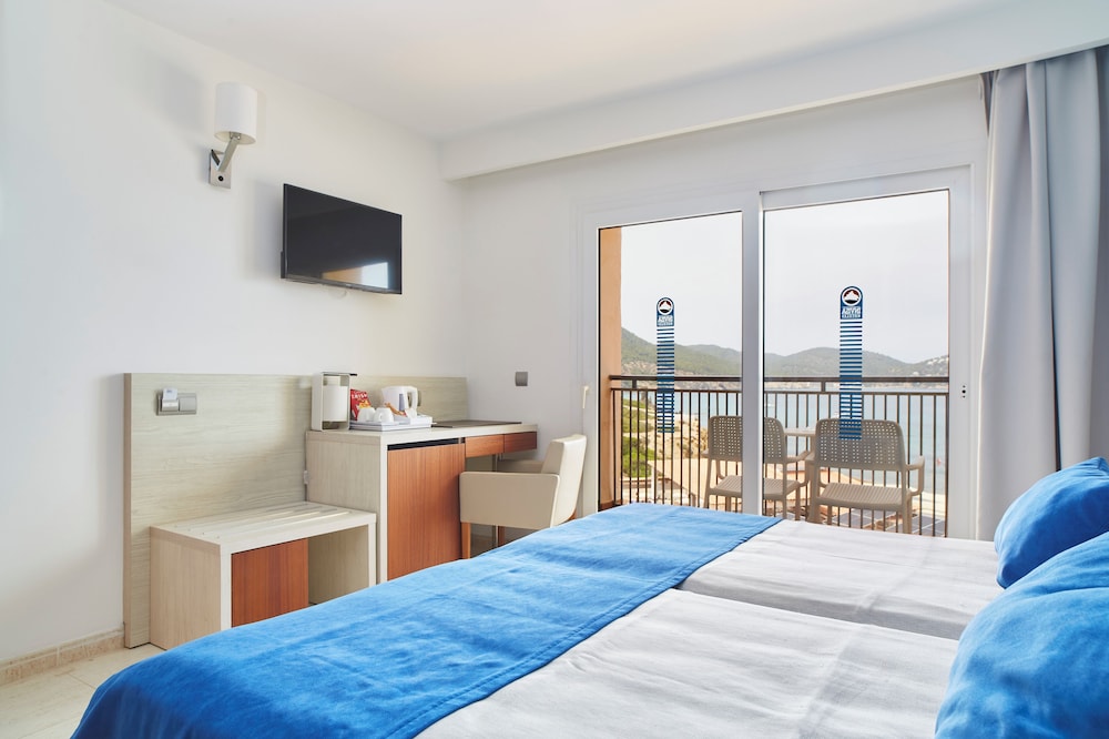 Invisa Hotel Club Cala Blanca — Hotel rooms in Santa Eulalia, Balearic Islands