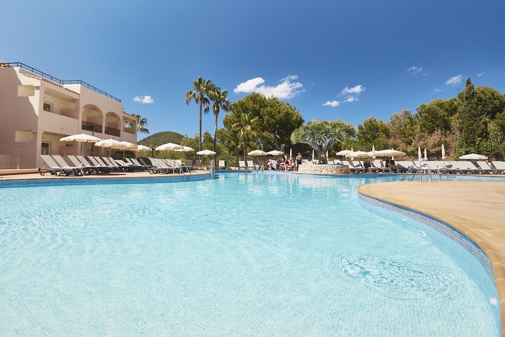 Invisa Hotel Club Cala Blanca — Swimming pool in Santa Eulalia, Balearic Islands