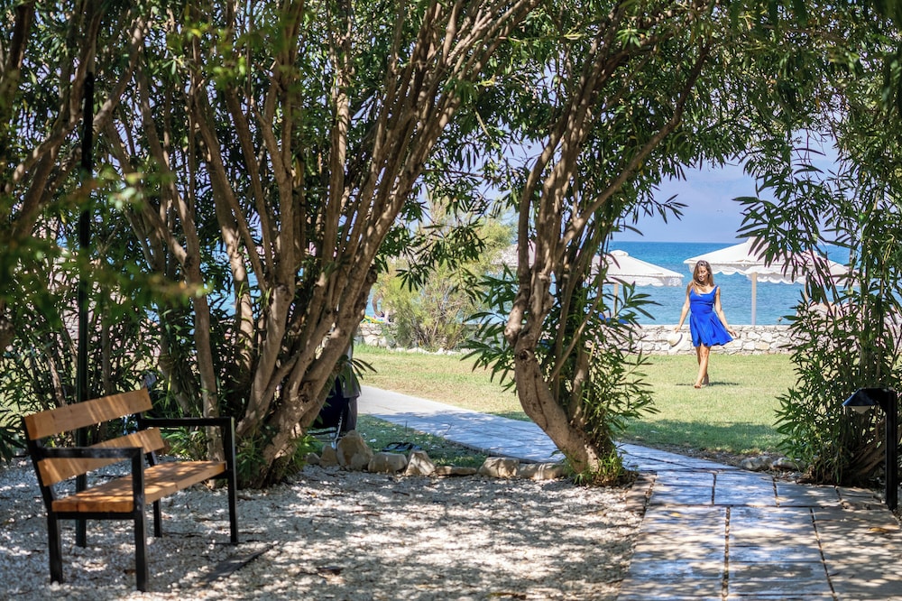 Roda Beach Resort & Spa All-inclusive — Beach in Roda, Ionian Islands
