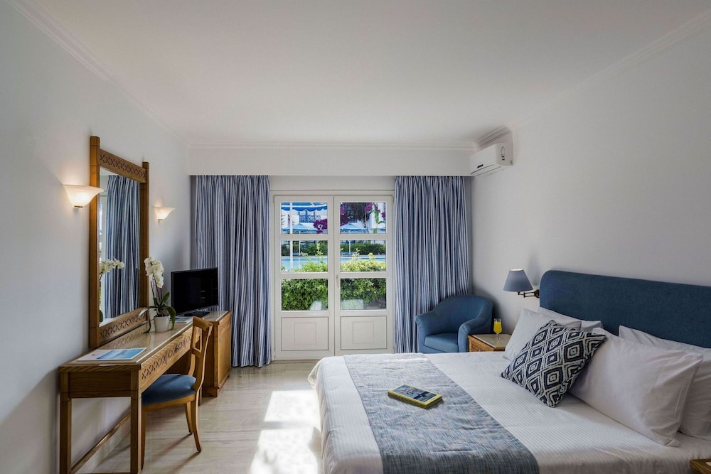 Mitsis Ramira — Hotel rooms in Psalidi, South Aegean