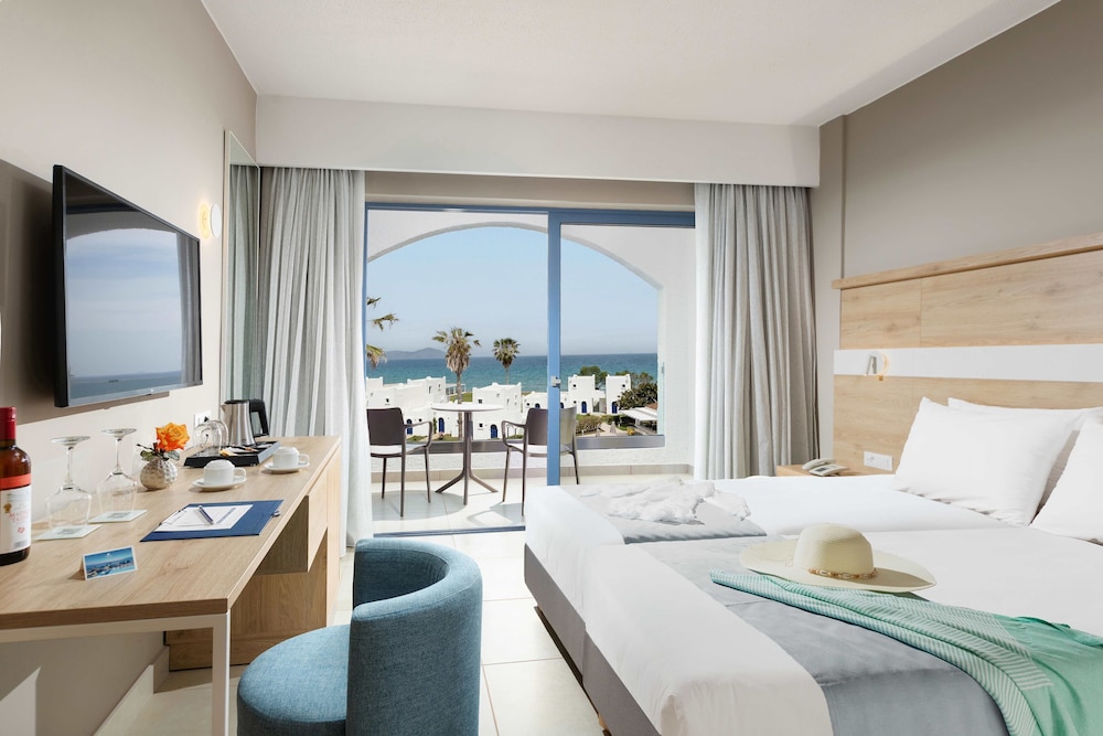 Aeolos Beach Hotel — Hotel rooms in Tigaki, South Aegean