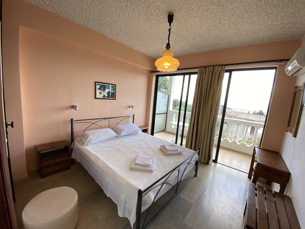 Andromaches Holiday Apartments — Hotel rooms in Benitses, Ionian Islands