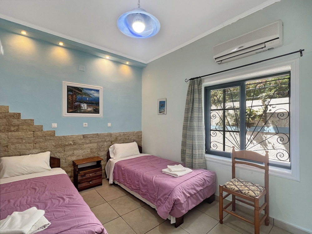 Andromaches Holiday Apartments — Hotel rooms in Benitses, Ionian Islands