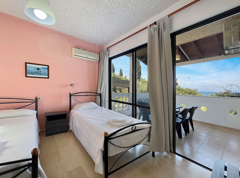 Andromaches Holiday Apartments — Hotel rooms in Benitses, Ionian Islands