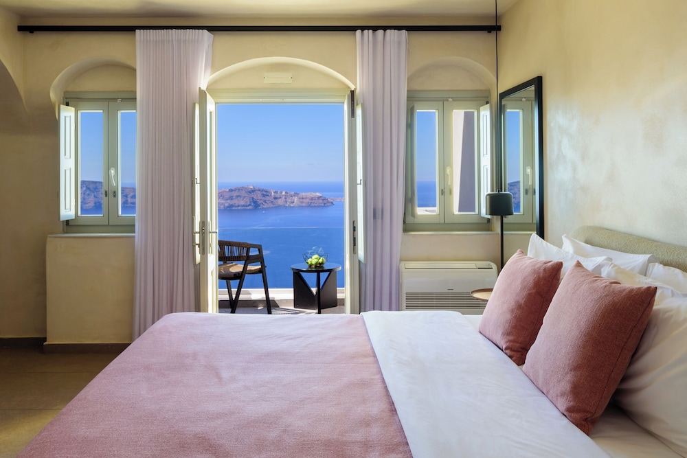 Andromeda Villas — Hotel rooms in Imerovigli, South Aegean