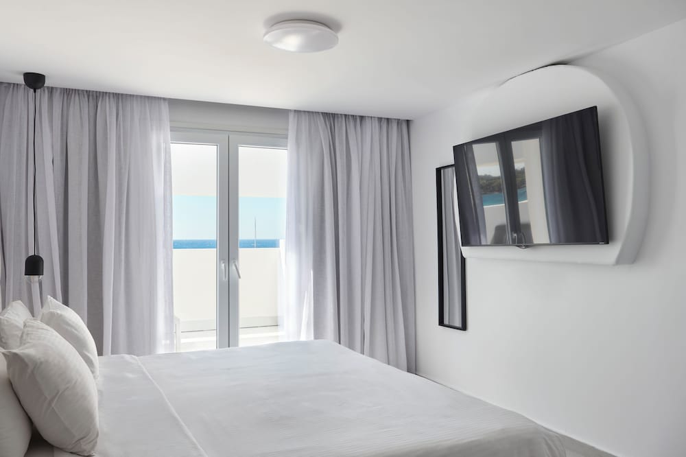 Kosmoplaz Beach Hotel — Hotel rooms in Plati Gialos, South Aegean
