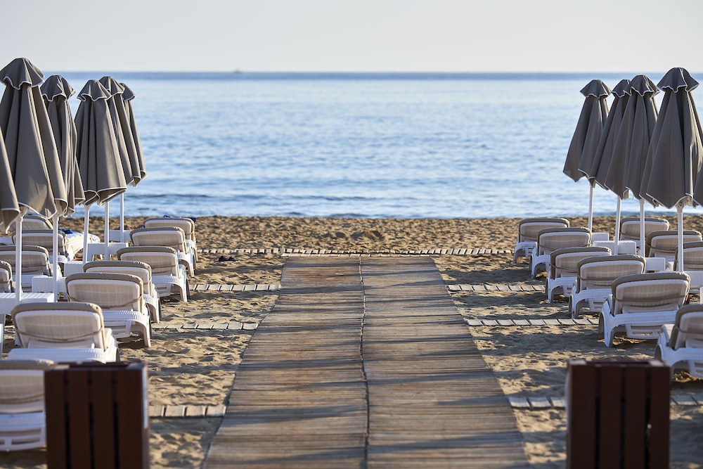 Mythos Palace Resort & Spa - All Inclusive — Beach in Georgioupolis