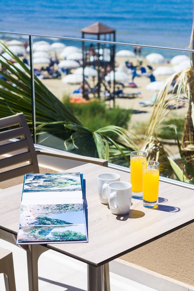 Theo Star Beach Hotel — Beach in Malia