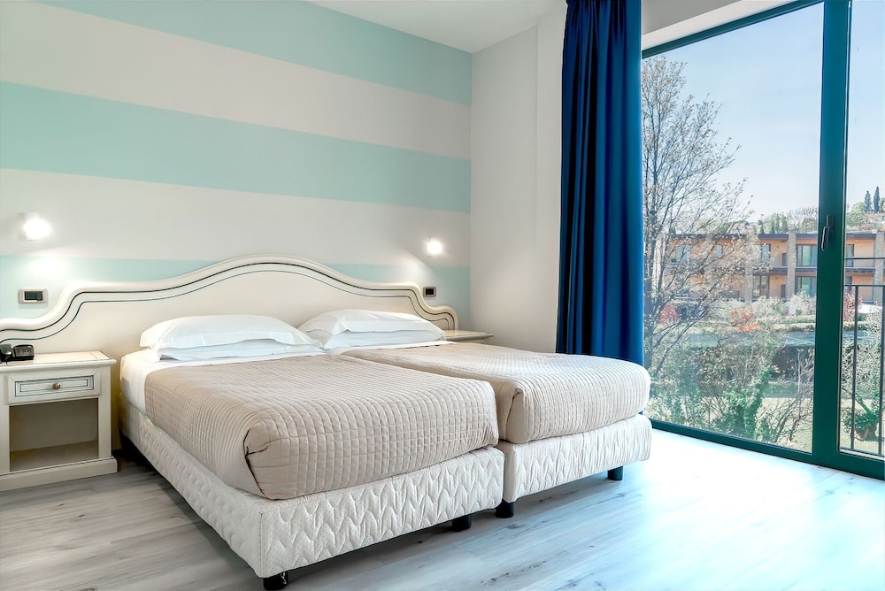 AHG Riva Del Sole Wellness Hotel - Adults Only — Hotel rooms in Moniga, Lombardy