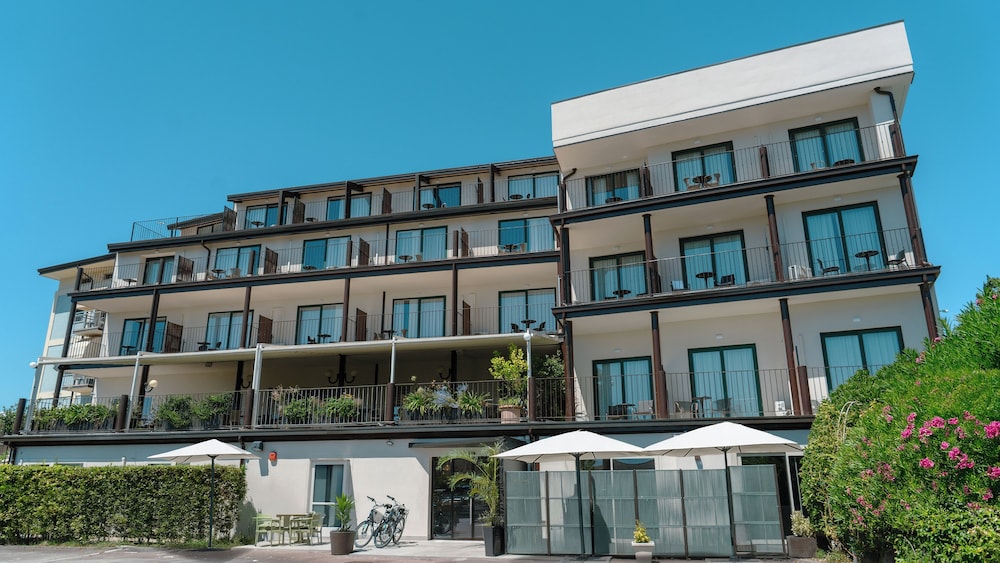 AHG Riva Del Sole Wellness Hotel - Adults Only — Hotel building in Moniga, Lombardy