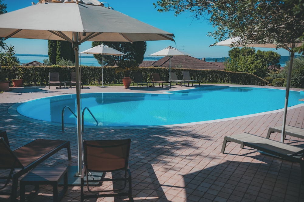 AHG Riva Del Sole Wellness Hotel - Adults Only — Swimming pool in Moniga, Lombardy