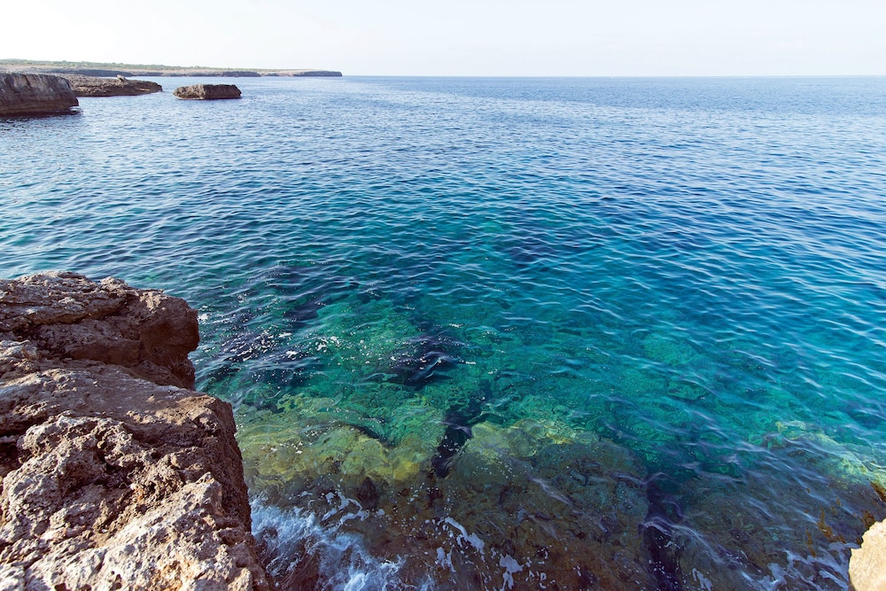 Apartamentos Cala Blanca — Beach in Cala Blanca, Balearic Islands