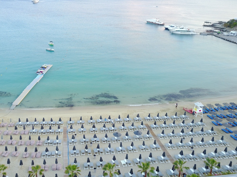 Mykonos Dove Beachfront Hotel — Beach in Plati Gialos, South Aegean