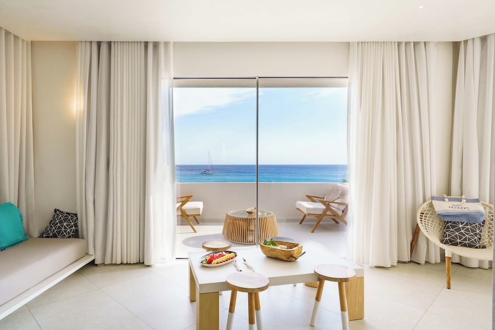 Mykonos Dove Beachfront Hotel — Hotel rooms in Plati Gialos, South Aegean