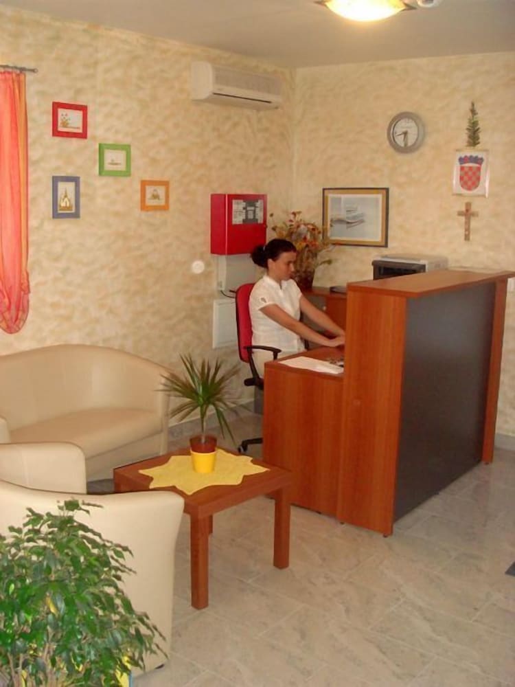 Apartments Ivana — Hotel building in Baška Voda, Split-Dalmatia