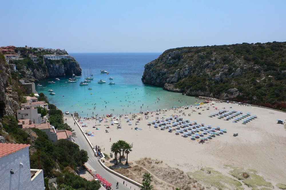 Aparthotel Nelva Resort — Beach in Cala'n Porter, Balearic Islands