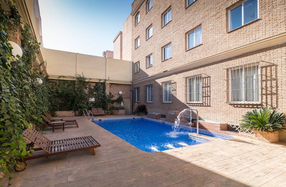 Hotel Bellavista Sevilla — Swimming pool in Seville, Andalusia
