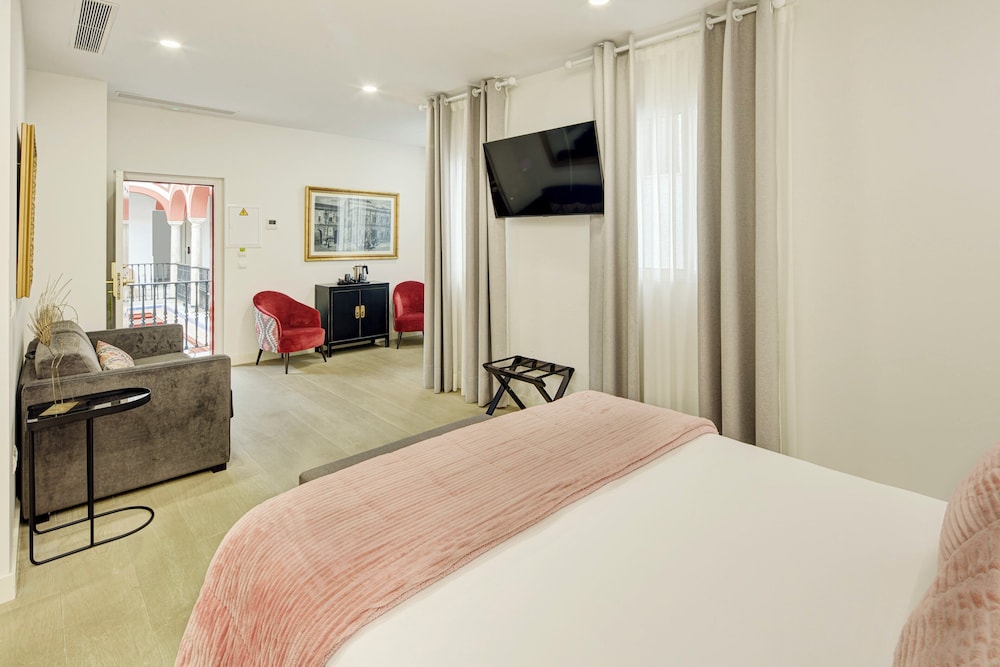 Sercotel Las Casas de los Mercaderes — Hotel rooms in Seville, Andalusia