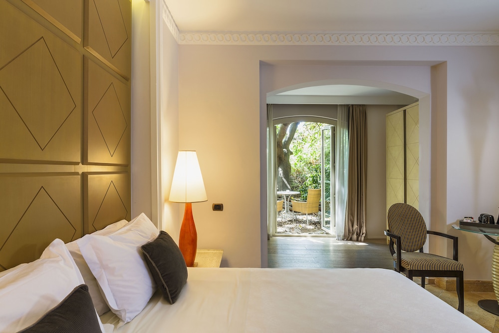Romano Palace Luxury Hotel — Hotel rooms in Catania, Sicily