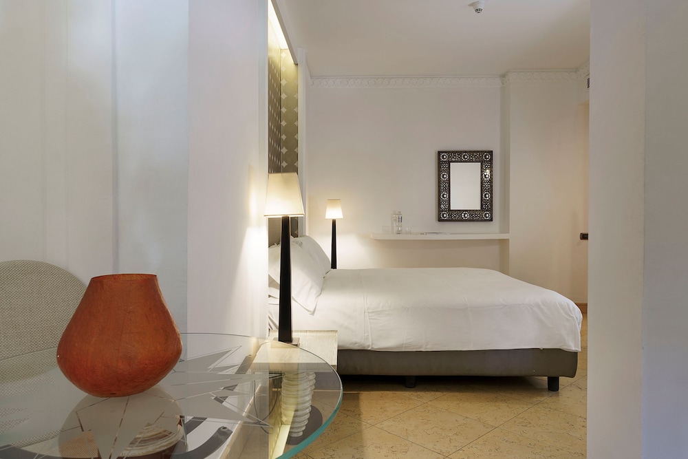 Romano Palace Luxury Hotel — Hotel rooms in Catania, Sicily