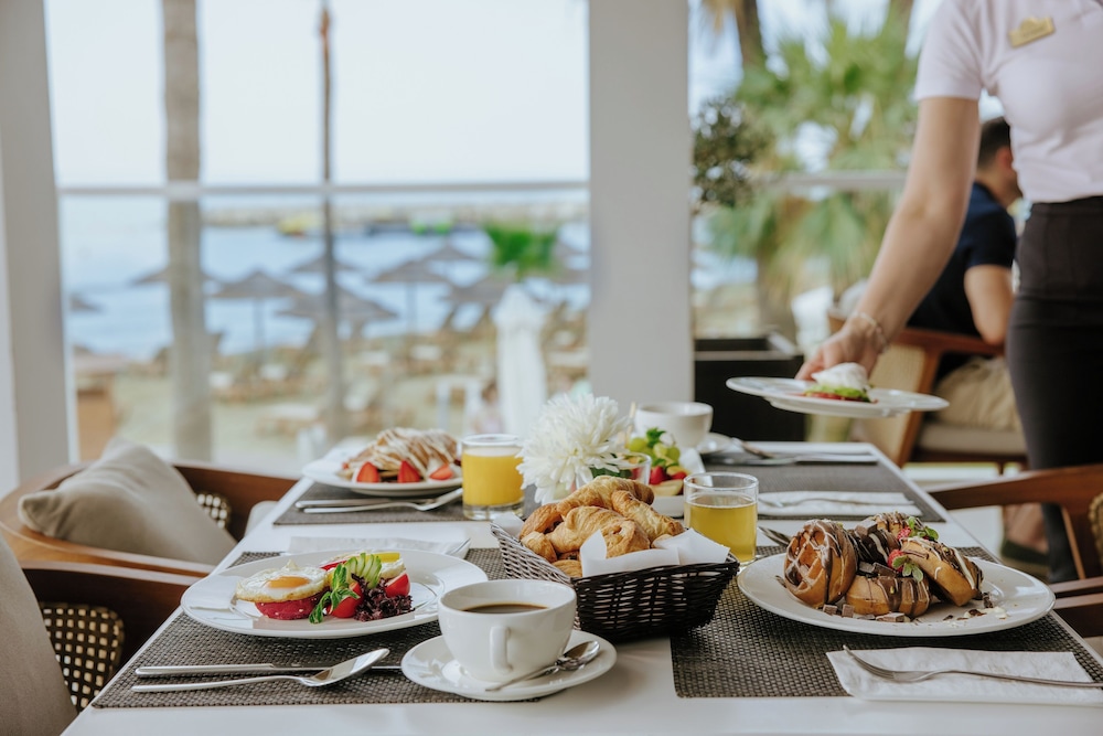 Golden Bay Beach Hotel — Restaurant & bars in Oroklini, Larnaca Region