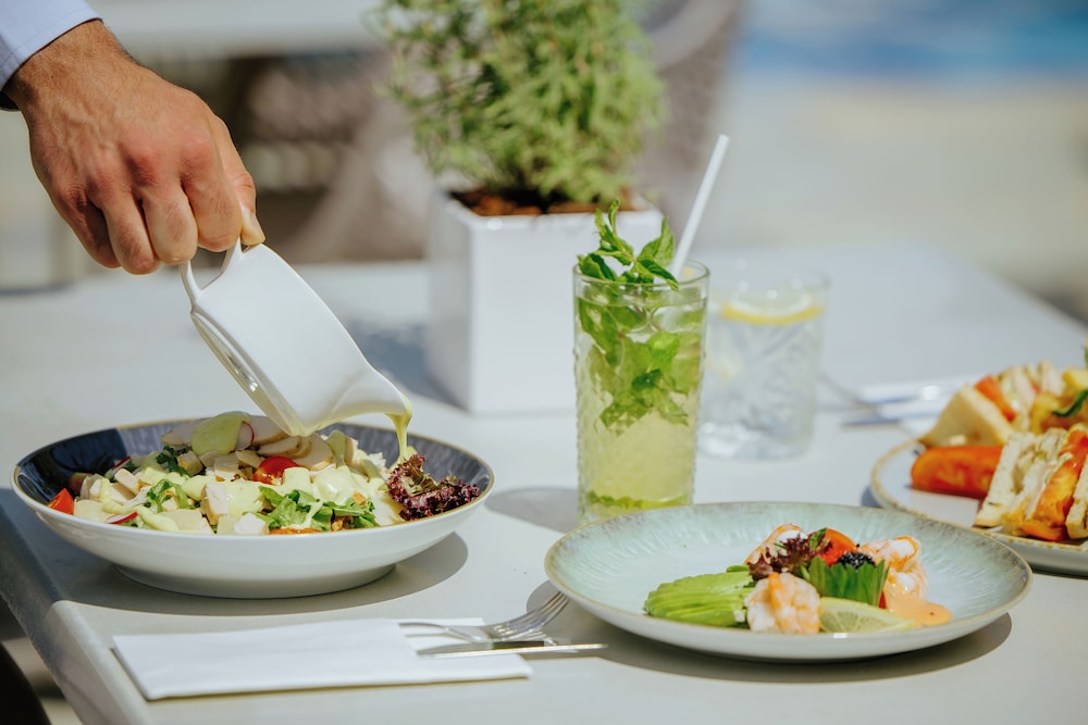 Golden Bay Beach Hotel — Restaurant & bars in Oroklini, Larnaca Region