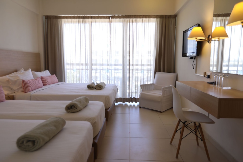 Sandy Beach Hotel & Spa — Hotel rooms in Oroklini, Larnaca Region