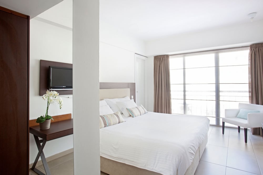 Sandy Beach Hotel & Spa — Hotel rooms in Oroklini, Larnaca Region