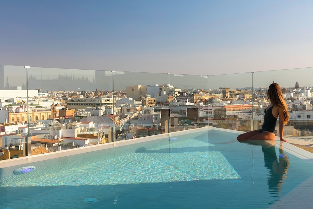 Hotel Colón Gran Meliá — Swimming pool in Seville, Andalusia