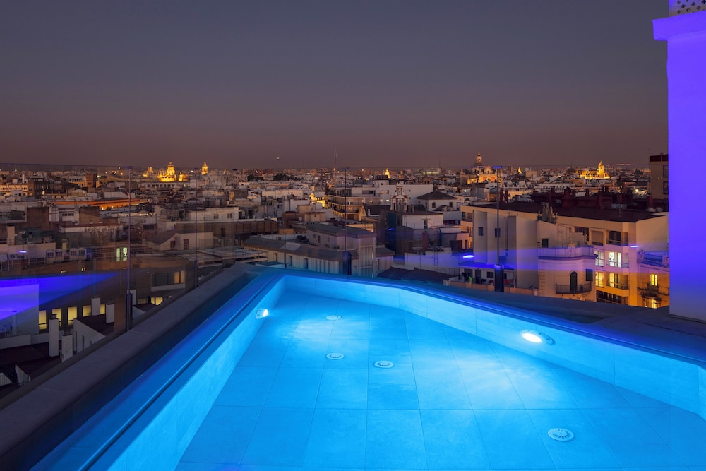 Hotel Colón Gran Meliá — Swimming pool in Seville, Andalusia