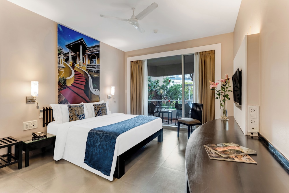 Whispering Palms Beach Resort — Hotel rooms in Candolim, Goa